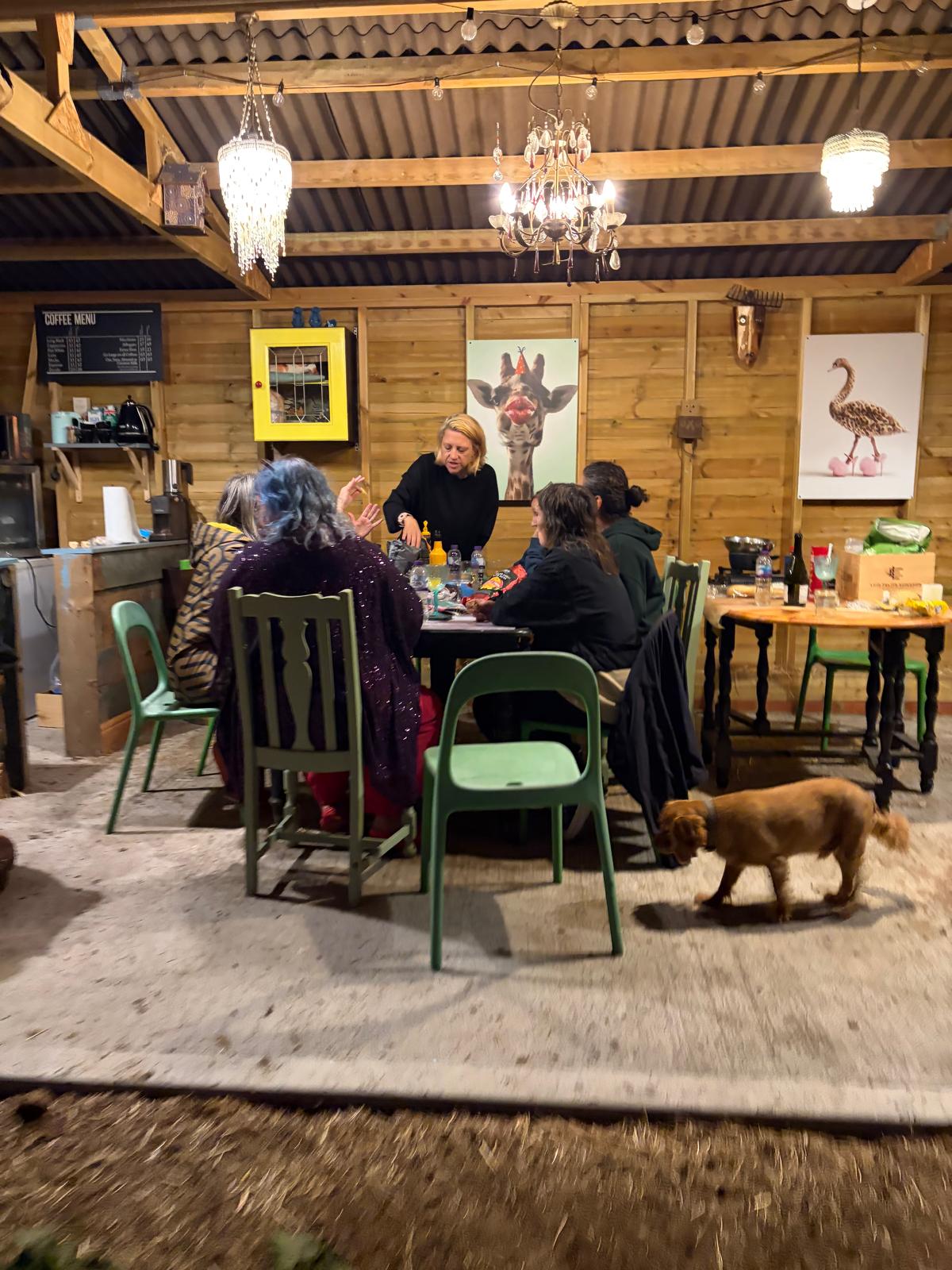 Gathering in the barn with tea, coffee and fairy lights
